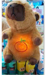 Capibara peluche que respira y musical.